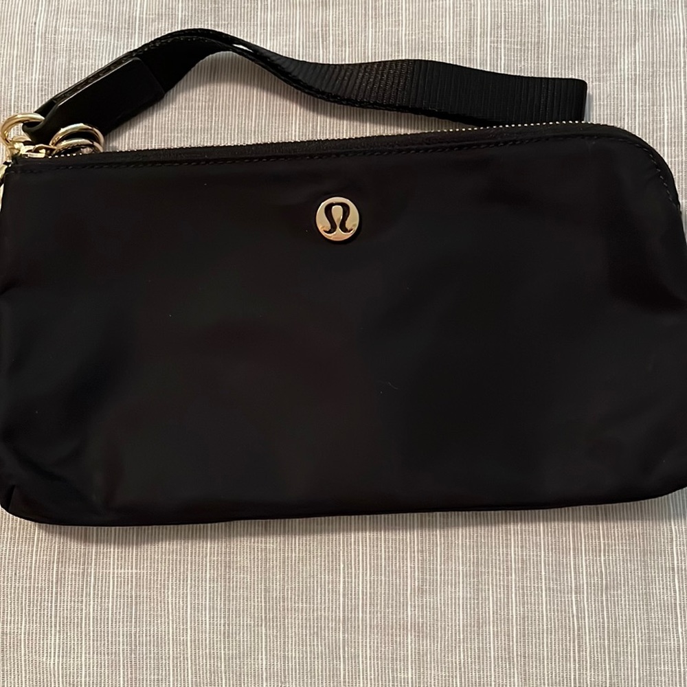 Microfiber black clutch wallet . Like new condition. Non smoking home.